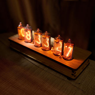 Six-tube IN-8 Nixie clock in laminated olive ash veneer