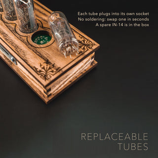 Replaceable IN-14 Nixie tube lifted out of its socket, no soldering needed