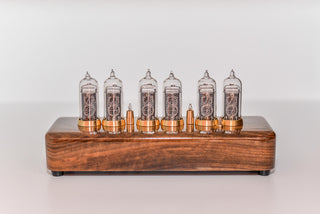 Front view of the six-tube IN-14 Nixie clock, tubes off, brass rings at every tube