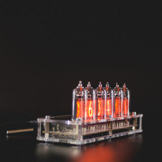 Six-tube Nixie clock from the side, temperature sensor lead beside it