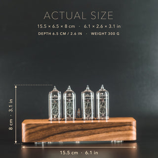 IN-14 Nixie tube clock in a solid walnut case with rounded corners, size marked: 15.5 cm (6.1 in) long, 6.5 cm deep, 8 cm (3.1 in) high, 300 g