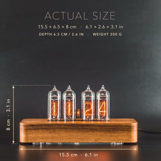 IN-14 Nixie tube clock in a solid ash case with rounded corners, size marked: 15.5 cm (6.1 in) long, 6.5 cm deep, 8 cm (3.1 in) high, 300 g