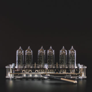 Six IN-14 tubes unlit, the board and buttons visible through the acrylic case